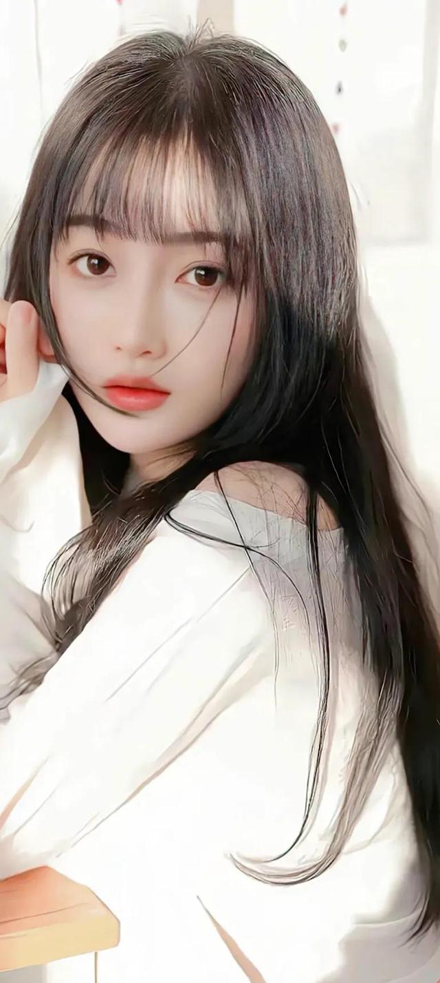 网红模特坐在店里拍照_美女壁纸桌面